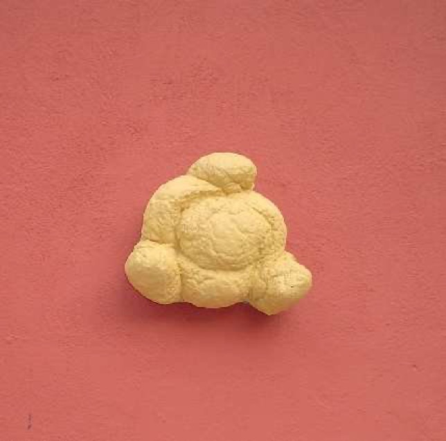 The-famous-Dali-bread-on-the-wall-of-the-museum